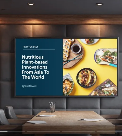Investor deck on a boardroom screen titled Nutritious Plant-based Innovations From Asia To The World