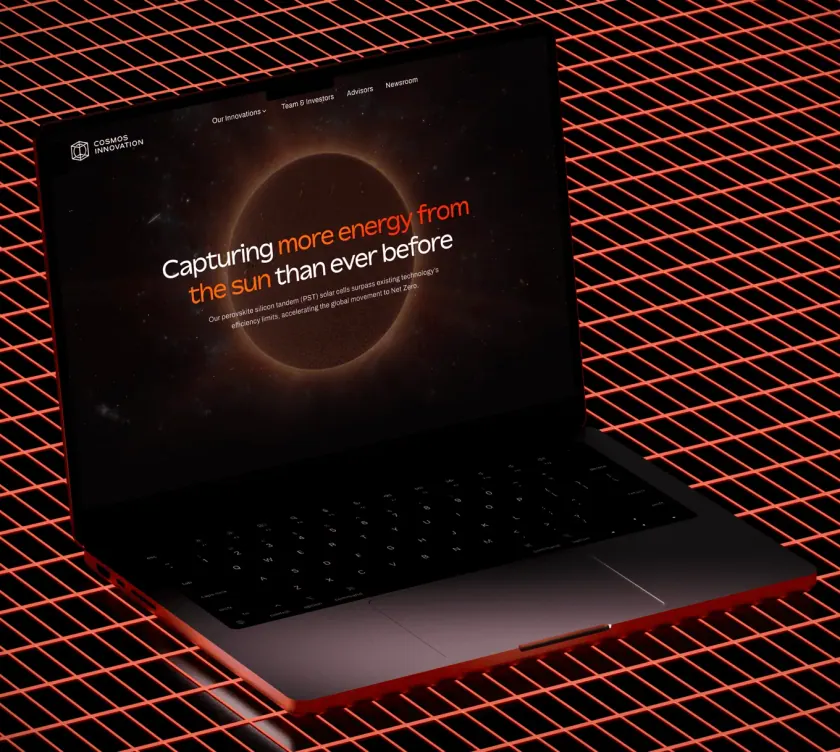Laptop showing a dark website with the headline Capturing more energy from the sun